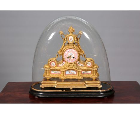 A FINE FRENCH GILT-METAL AND PORCELAIN MANTEL CLOCK, 19TH CENTURY, the urn surmount with porcelain painted portrait miniature