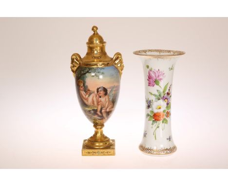 A DRESDEN PAINTED AND GILDED PEDESTAL VASE AND COVER, LATE 19TH CENTURY, the ovoid body painted with a child playing a flute 