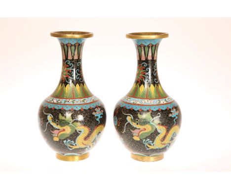A PAIR OF CHINESE CLOISONNE ENAMEL BOTTLE SHAPED VASES, EARLY 20TH CENTURY, decorated with dragons chasing the flaming pearl.