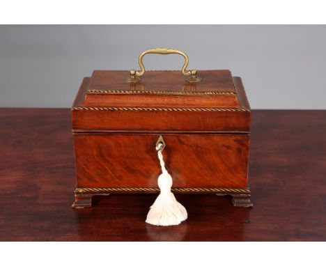 A GEORGE III MAHOGANY TEA CADDY, with chequered inlay, brass handle and bracket feet.