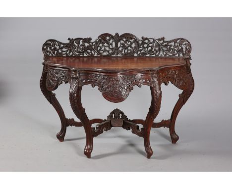AN ANGLO-INDIAN ROSEWOOD CONSOLE TABLE, 19TH CENTURY, with foliate carved and pierced backboard above a shaped top with mould
