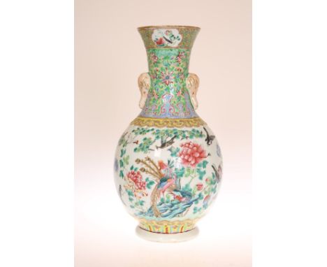 A CHINESE FAMILLE ROSE BOTTLE VASE, enamel painted with phoenix, birds and flowers. 36.5cm