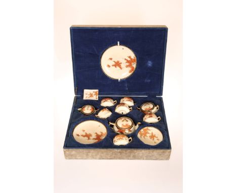 A JAPANESE SATSUMA TEA SERVICE IN A FITTED CASE, EARLY 20TH CENTURY, probably Kozan, comprising teapot, sucrier, cream jug, s