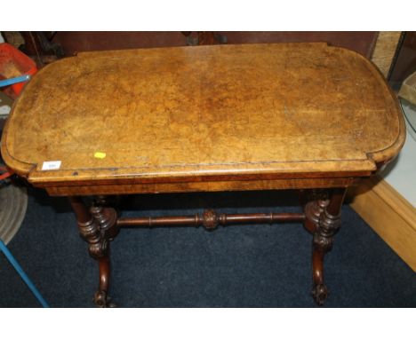A WALNUT FOLD OVER CARD TABLE 