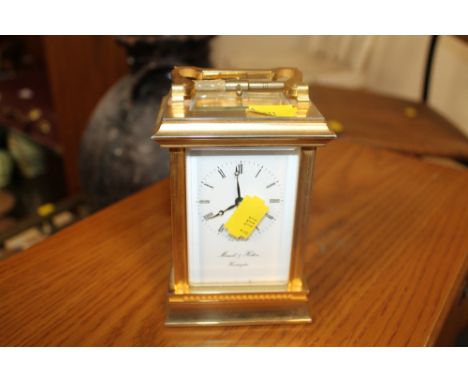 A BRASS MORRELL AND HILTON CARRIAGE CLOCK
