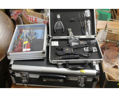 A CASED TOMASHI CAMERA AND ACCESSORIES, TOGETHER WITH A SELECTION OF TOOLS