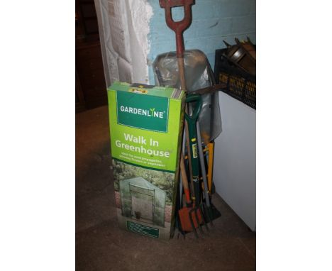 A WALKING GREENHOUSE AND A SELECTION OF TOOLS