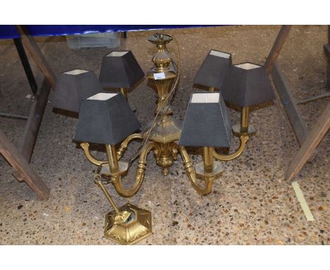 Brass six branch light fitting with black shades