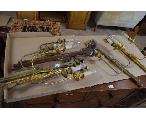 A set of six gilt wood effect two light wall sconces with ribbon decoration
