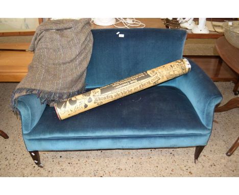 An Edwardian blue upholstered two seather sofa