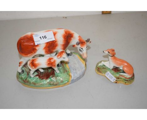 Staffordshire style model of a cow and calf together with a further model of a greyhound