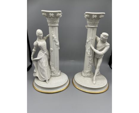 Romeo and Juliet Candelabra.

Two porcelain candlesticks/ candle holders of Franklin Mint, from 1986
Romeo and Juliet.
Fine p