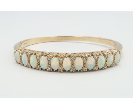 A 9ct and opal and diamond bracelet, approx 21.99 grams 