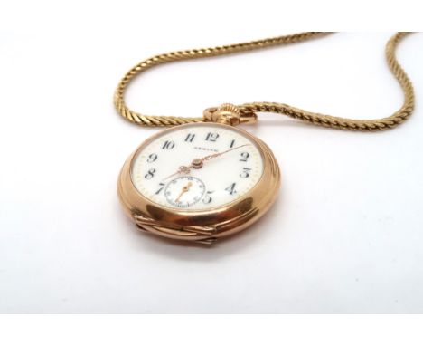 An 18ct yellow gold Zenith pocket watch on yellow metal chain - approx. weight 21.2 grams 