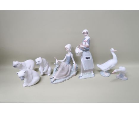 Six Lladro figures including Polar Bears (3), Goose and seated Lady with Bird, one Nao Goose included, the tallest 23cm high 