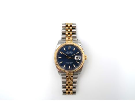 A Rolex Oyster Perpetual Datejust bimetal wristwatch Blue enamel dial with baton markers, date aperture at 3 O'clock.- Garant