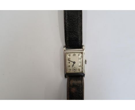A Gents Zenith automatic watch on a black leather strap, running in saleroom 
