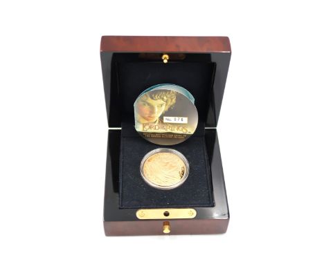 A New Zealand 10 dollar face value coin in 22ct gold - Lord of the Rings, Frodo and The One Ring - Limited Edition 76 of 15,0