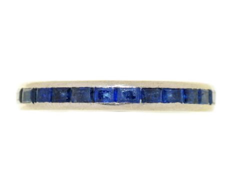 A SAPPHIRE ETERNITY RING, WITH CHANNEL SET BAGUETTE SAPPHIRES, IN WHITE GOLD, 3G, SIZE M½++LIGHT WEAR AND SCRATCHES CONSISTEN