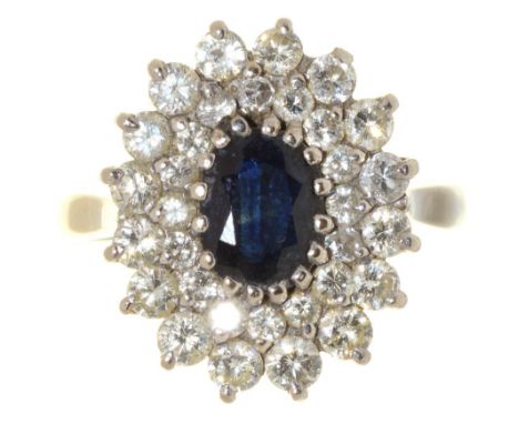 A SAPPHIRE AND DIAMOND CLUSTER RING, DIAMONDS APPROX 0.8 CARAT, IN WHITE GOLD MARKED 18CT, 4.5G, SIZE O++LIGHT WEAR CONSISTEN