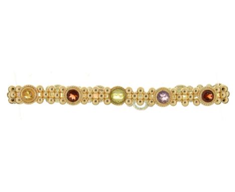 A GOLD BRACELET SET WITH TOPAZ, AMETHYST, GARNET, PERIDOT AND CITRINE, UNMARKED, 4G++IN GOOD CONDITION, LIGHT WEAR CONSISTENT