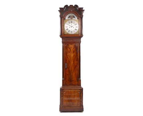 A MAHOGANY EIGHT DAY LONGCASE CLOCK the 13" arched brass dial with silvered Roman chapter ring, Arabic five minutes, silvered