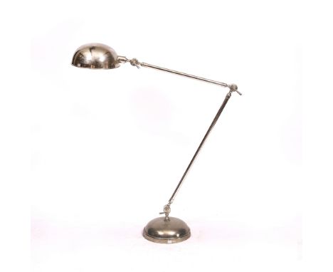 A CHROME PLATED FLOOR STANDING OVERSIZED JOINTED LAMP the dome shade and conforming domed base, approximately 126cm high (adj