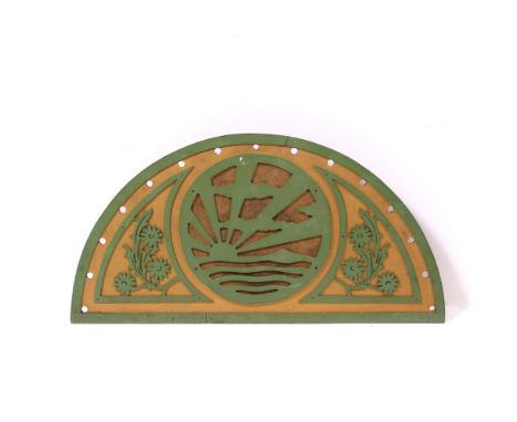 AN ART DECO GREEN AND GOLD PAINTED SPEAKER PANEL probably from a theatre or cinema, with sun burst and flower fret work decor