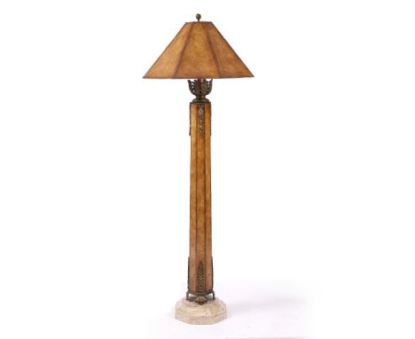 A LAMP STANDARD with cast brass mounts, octagonal column and on a spreading stone plinth base, 175cm high overall