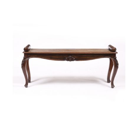 A VICTORIAN WALNUT WINDOW SEAT with scroll ends, standing on carved cabriole legs, 117cm x 52cm x 29cm