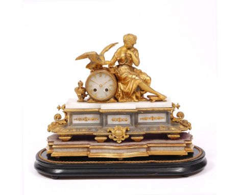 AN ANTIQUE FRENCH GILT SPELTER MANTLE CLOCK the alabaster mounted case surmounted by a figure feeding an eagle, the alabaster