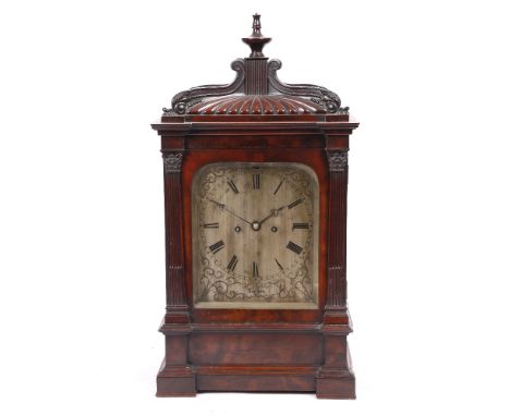 A VICTORIAN MAHOGANY BRACKET OR TABLE CLOCK with silvered Roman dial, strike/silent lever at 12 o'clock, trefoil blued steel 