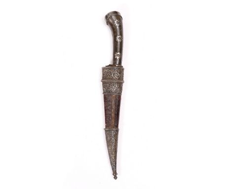 A PERSIAN OR INDIAN DAGGER WITH SCABBARD the horn grip with white metal mounts, the leather scabbard with floral decoration t