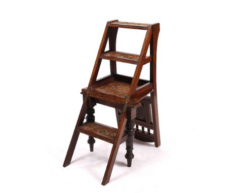 A SET OF VICTORIAN WALNUT METAMORPHIC LIBRARY STEPS the chair with carved panel back, transforming into a set of steps with c