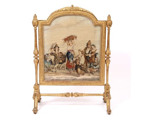 A 19TH CENTURY GILDED GESSO FIRE SCREEN with a glazed tapestry centre and scrolling feet, 82cm wide x 110cm high