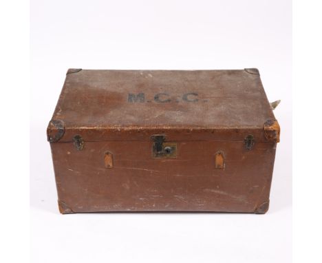 AN OLD CANVAS LEATHER MOUNTED TRUNK with initials MCC to the lid, 84cm wide x 51cm deep x 40.5cm high