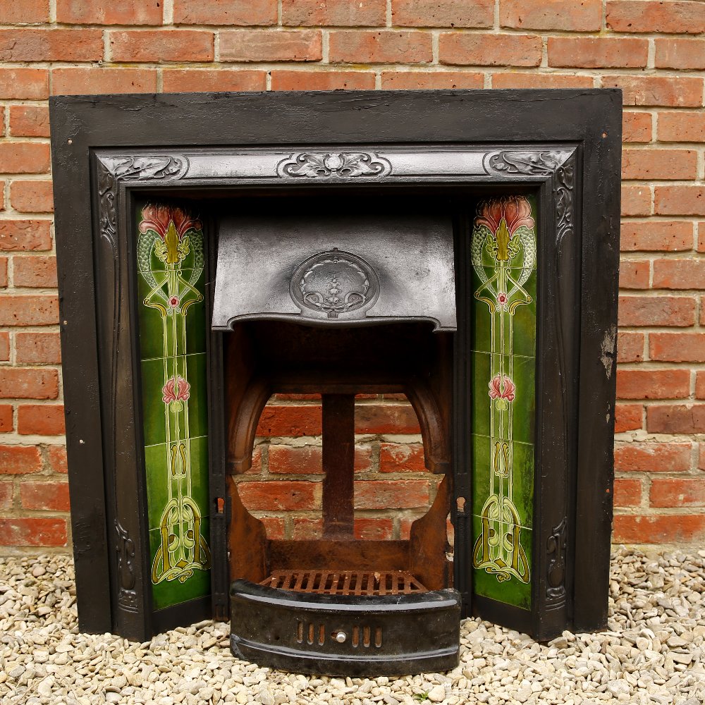 A Late Victorian Or Edwardian Cast Iron Fireplace Inset Set With