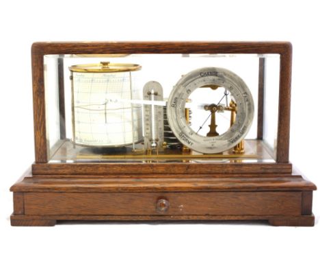 AN ANTIQUE OAK CASED BAROGRAPH by Negretti and Zambra numbered 30368, the barograph with cylinder thermometer and silvered di