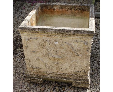 A COMPOSITE CUBIC PLANTER  with classical decoration and on bracket feet, 48cm wide x 47cm high