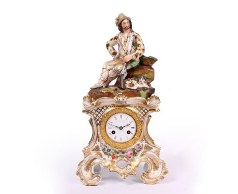 A CONTINENTAL MANTLE CLOCK the porcelain case with gilt and coloured enamel flower decoration, scrolling feet and surmounted 