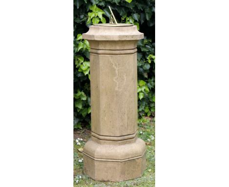 A BRASS SUNDIAL on octagonal buff stoneware plinth, 78cm high x 28cm wide 