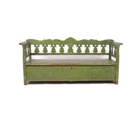 AN ANTIQUE GREEN PAINTED SETTLE with shaped splats and box seat, 200cm wide x 93cm high