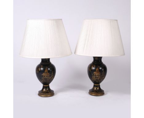 A PAIR OF BLACK AND PARCEL GILT PAINTED TURNED WOODEN BALUSTER TABLE LAMPS each lamp base 38cm high and each lamp 66cm high o