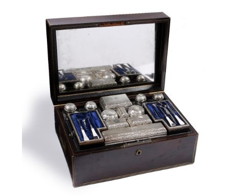 AN EARLY 19TH CENTURY ROSEWOOD TRAVELLING CASE with a selection of early Victorian silver mounted dressing table requisites i