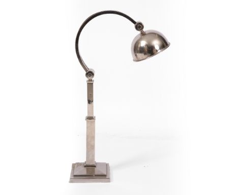 A CHROME PLATED TABLE LAMP with hinged shade and square base, 73cm high approximately