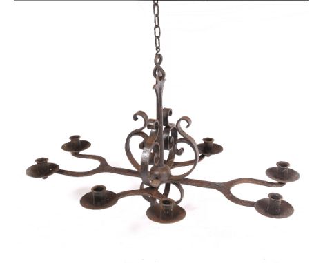 AN ANTIQUE WROUGHT IRON HANGING LIGHT FITTING approximately 115cm wide 