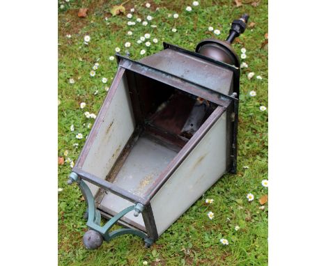 AN OLD COPPER HANGING STREET LANTERN of square tapering form with stepped finial, 36cm wide x 90cm high overall