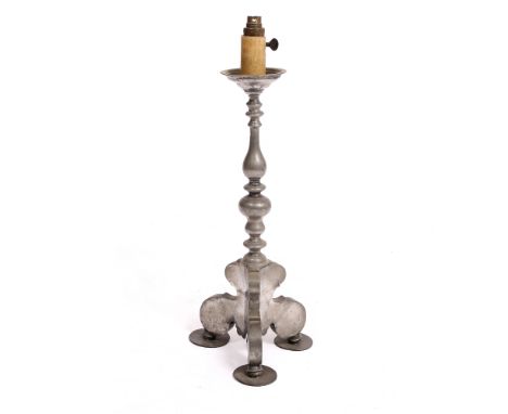 AN ANTIQUE DUTCH PEWTER PRICKET CANDLESTICK with turned stem and tripod base, later converted for use as a table lamp, 60cm h