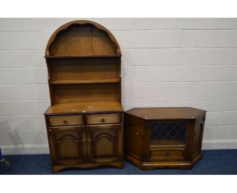 AN OAK DUTCH DRESSER, with two drawers, width 92cm x depth 41cm x height 183cm and an oak lead glazed corner cabinet flanked 