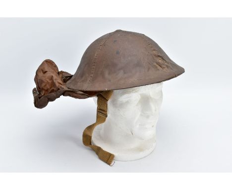 A BRITISH/CANADIAN ISSUE WWI ARMY STEEL HEMLET, complete with liner, chin strap etc, this example has the addition of the Ant